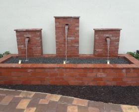 Water Feature Design with Hardscaping and Retaining Walls